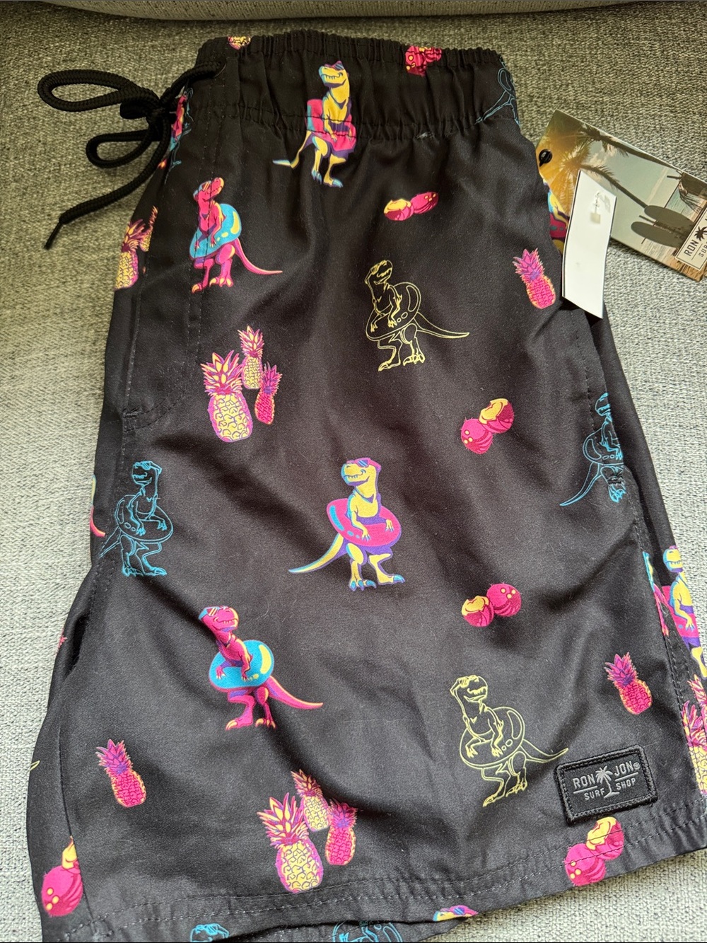 Ron Jon Black Swim Trunks with Neon Dinosaur & Pineapple Print